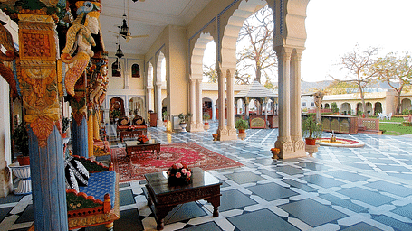 A veranda at The Raj Palace