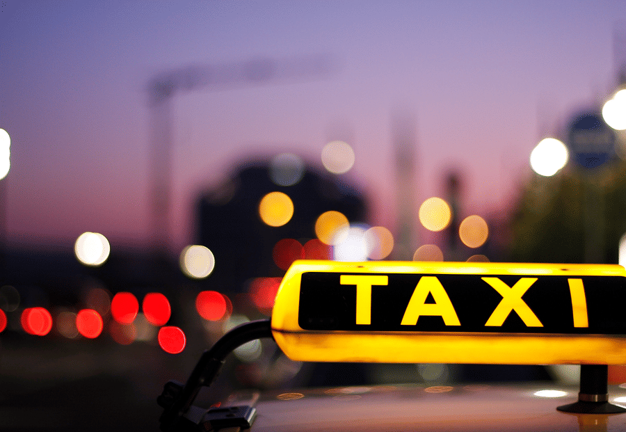 Image of a signage with taxi written on it.