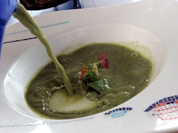 An image of a soup bowl being served