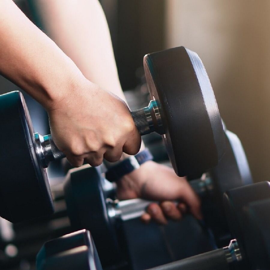 Image of a hand lifting a dumbbell