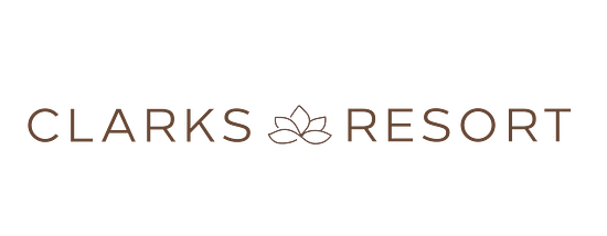 Logo of Clarks Resort with a flower placed between Clarks and Resort.