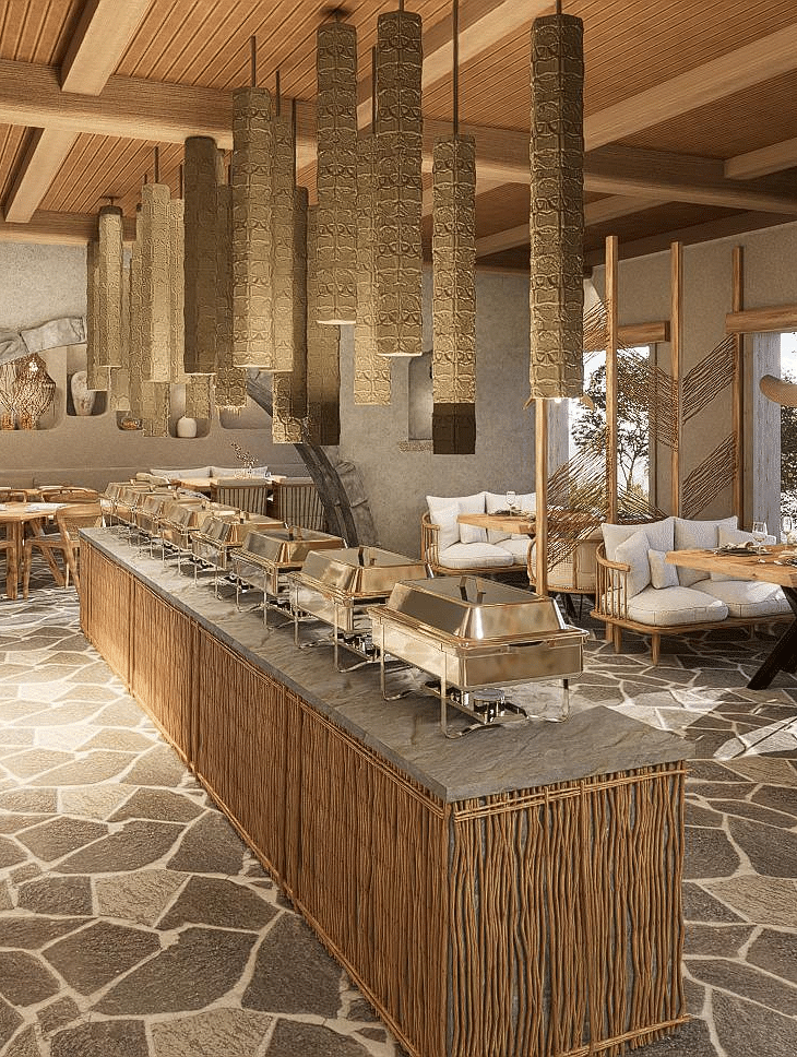 Stylish dining space with table and chair settings, enhanced by a chandelier dangling from the ceiling at The Evren, Vagator.