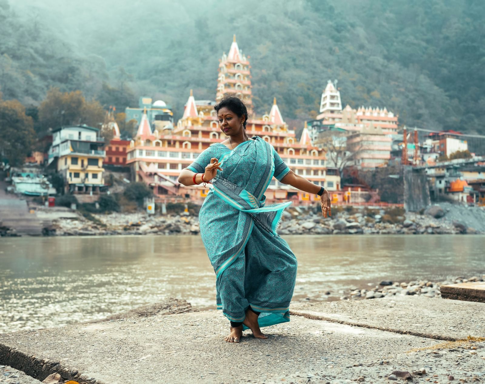 image of a woman performing classical dance.
