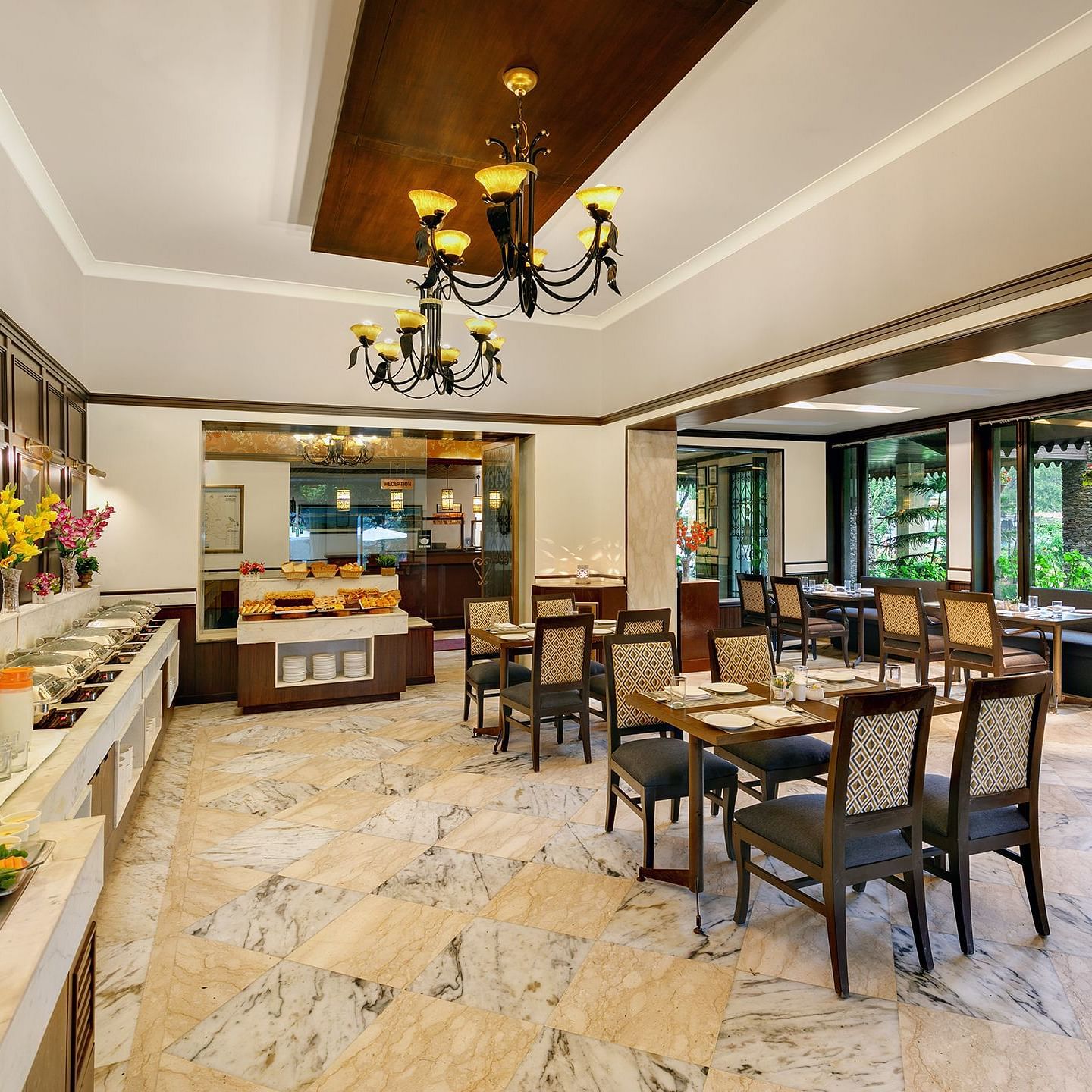 A resturant with chair and table well furnished and decorated 