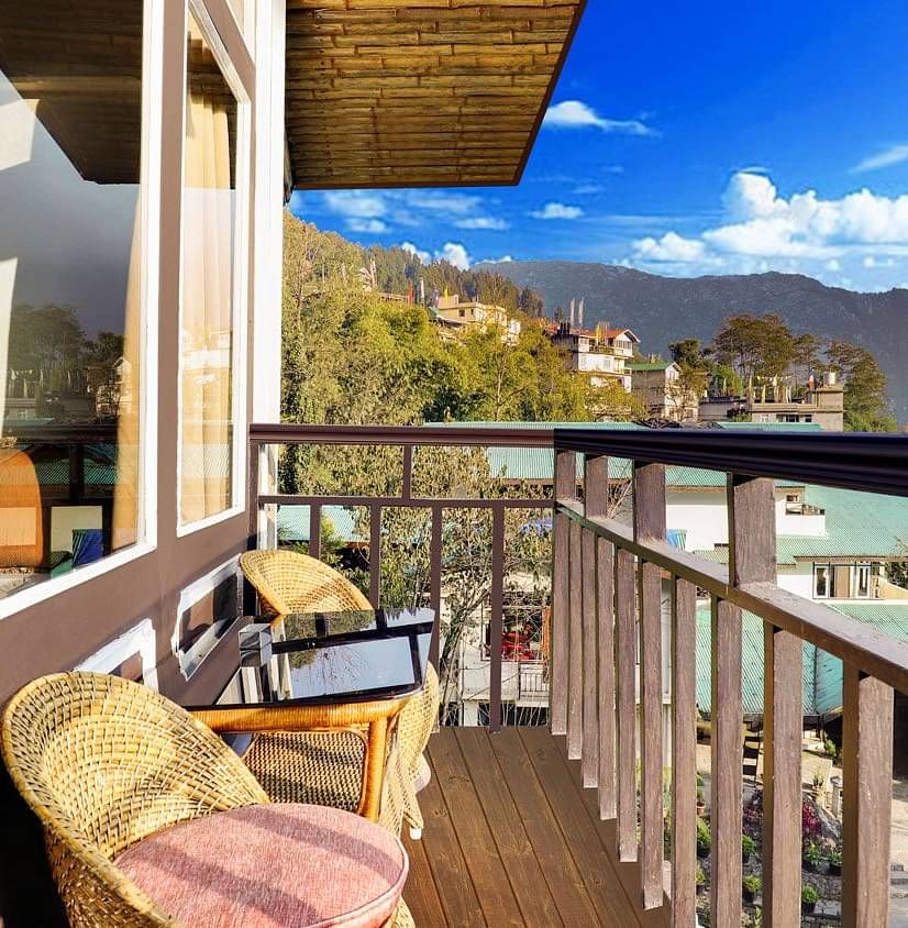 Chairs placed outside the balcony of a room at Summit Norling Resort and Spa