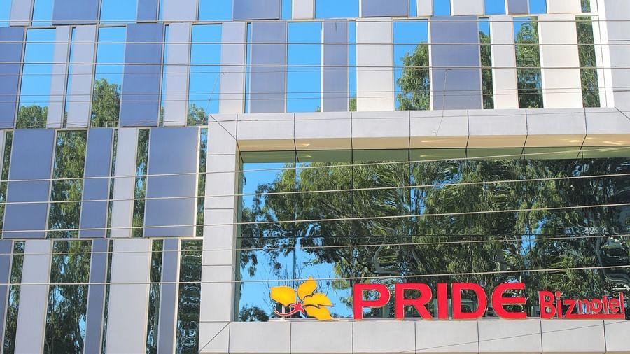 Pride Biznotel Haldwani building with glass exterior
