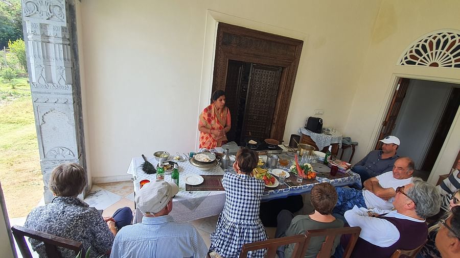 Tourists attending the cooking classes at Dev Shree, Deogarh 