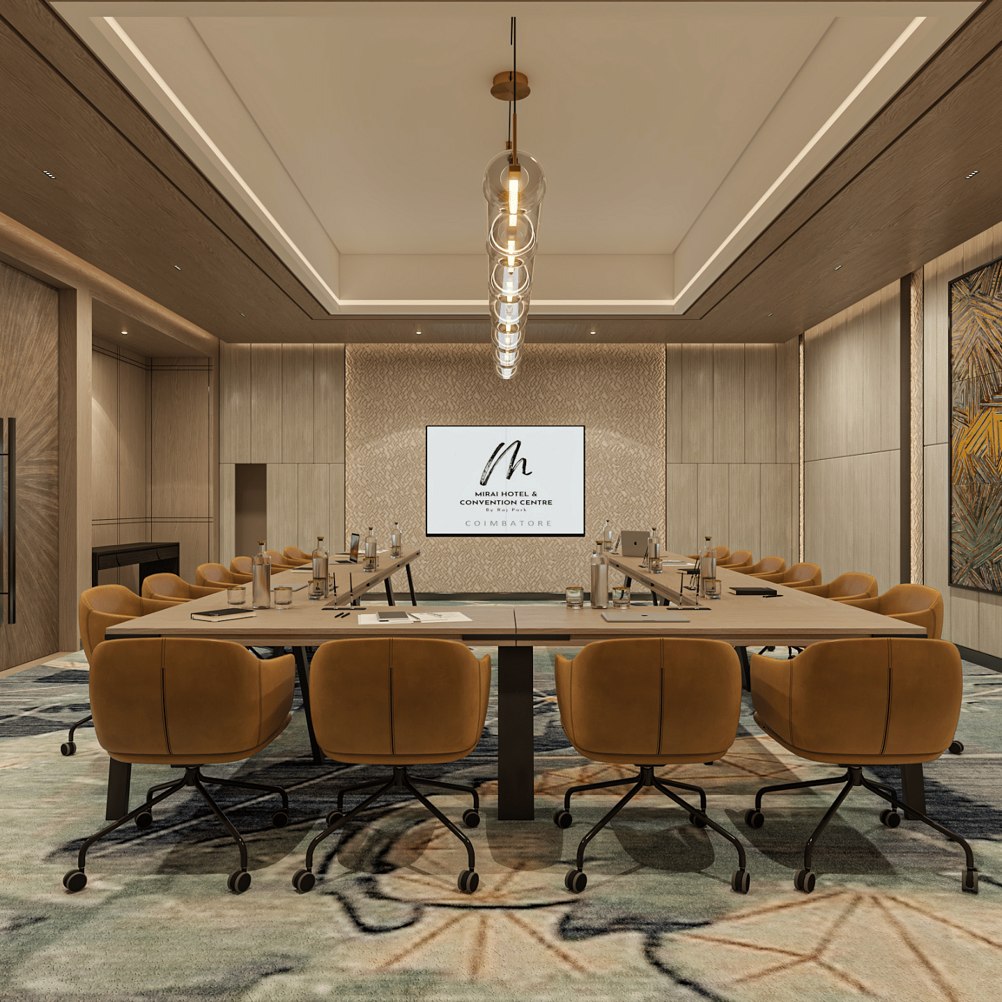 A U-shape boardroom seating arrangement with lights, decor frame and projector upfront