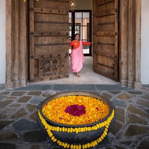 Staff  Welcoming Guests at the door