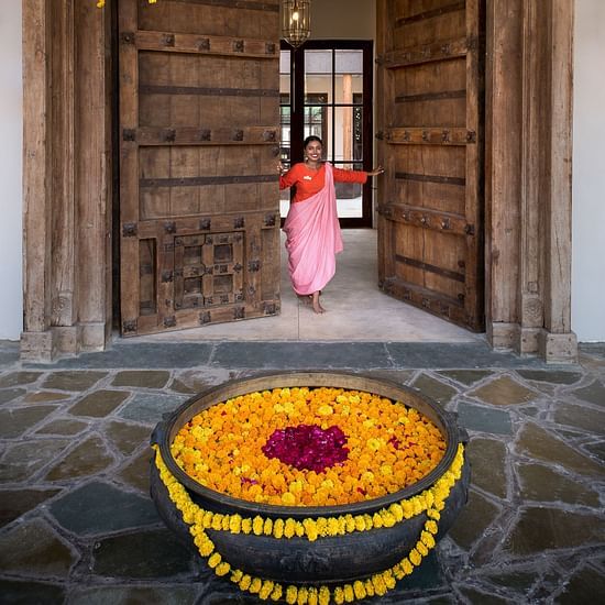 Staff  Welcoming Guests at the door