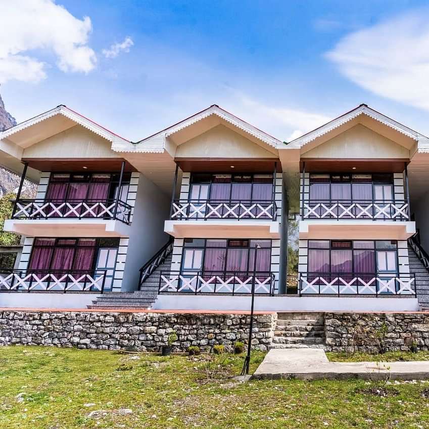 Facade of Whispering Pines By Summit, Lachung, featuring a charming garden in front and a bright