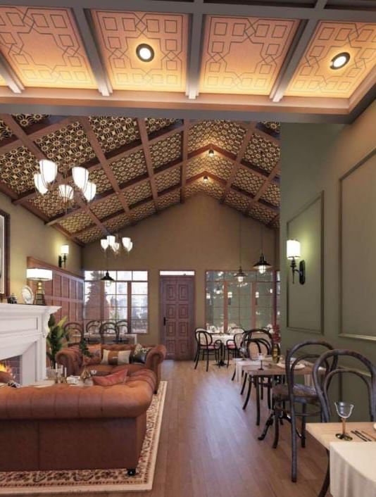 Elegant restaurant interior with a vaulted woven ceiling, classic panelling, and formal dining tables under warm lighting at BluSalzz Terrah Hills Resort, Dalhousie.