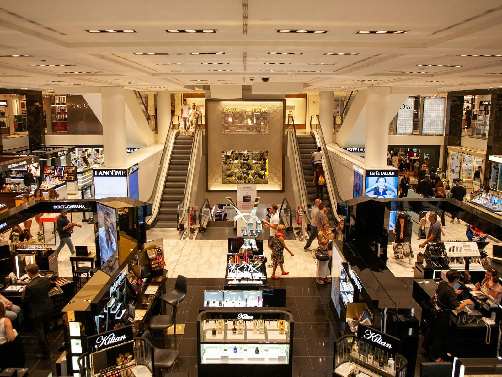 A image of a shopping mall with multiple levels and stores.