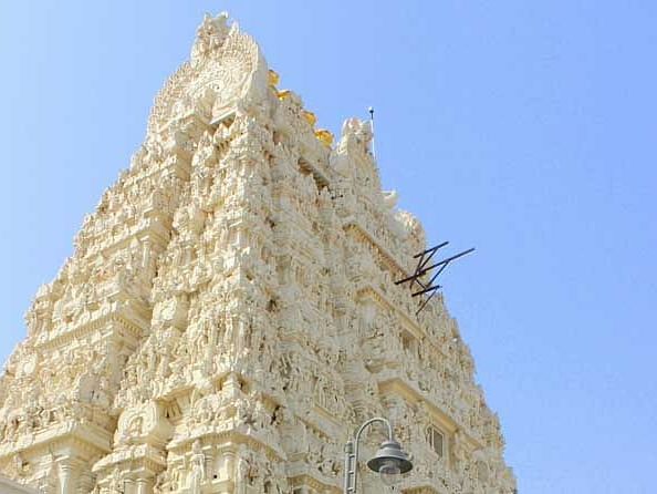 An image of a temple with a clear blue sky in the background