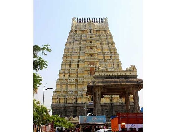 An image of a temple structure with a clear blue sky in the background