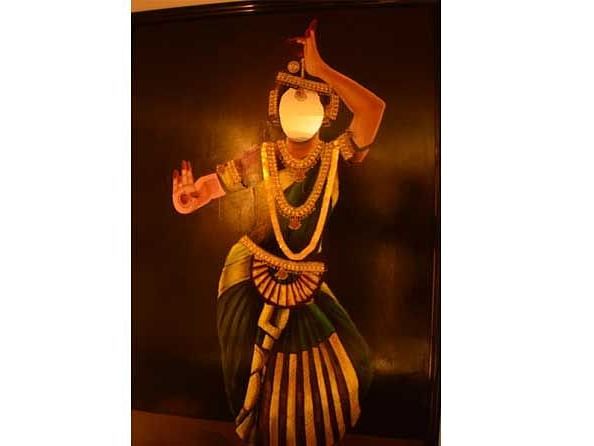 An image of a women in a traditional attire