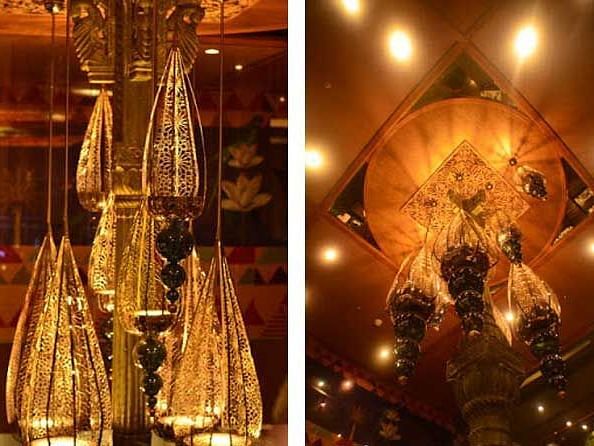 A collage image of two chandeliers hanging from the ceiling which is lit with warm yellow lighting