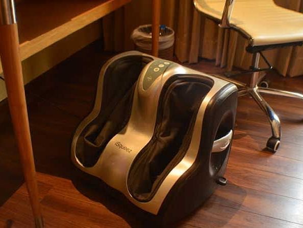 An image of an electric foot massager in a room.