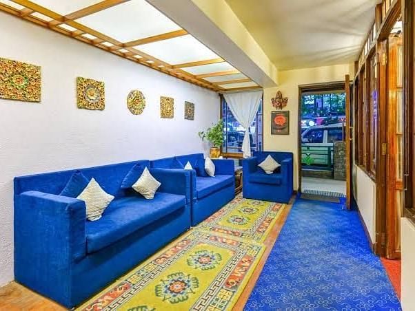 Lobby area of Sumitel Oriental with sofa set, carpets and decoration