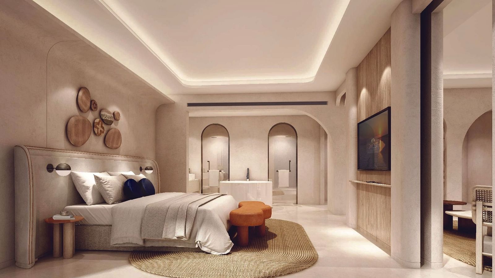 A hotel room with a double bed and white ambience