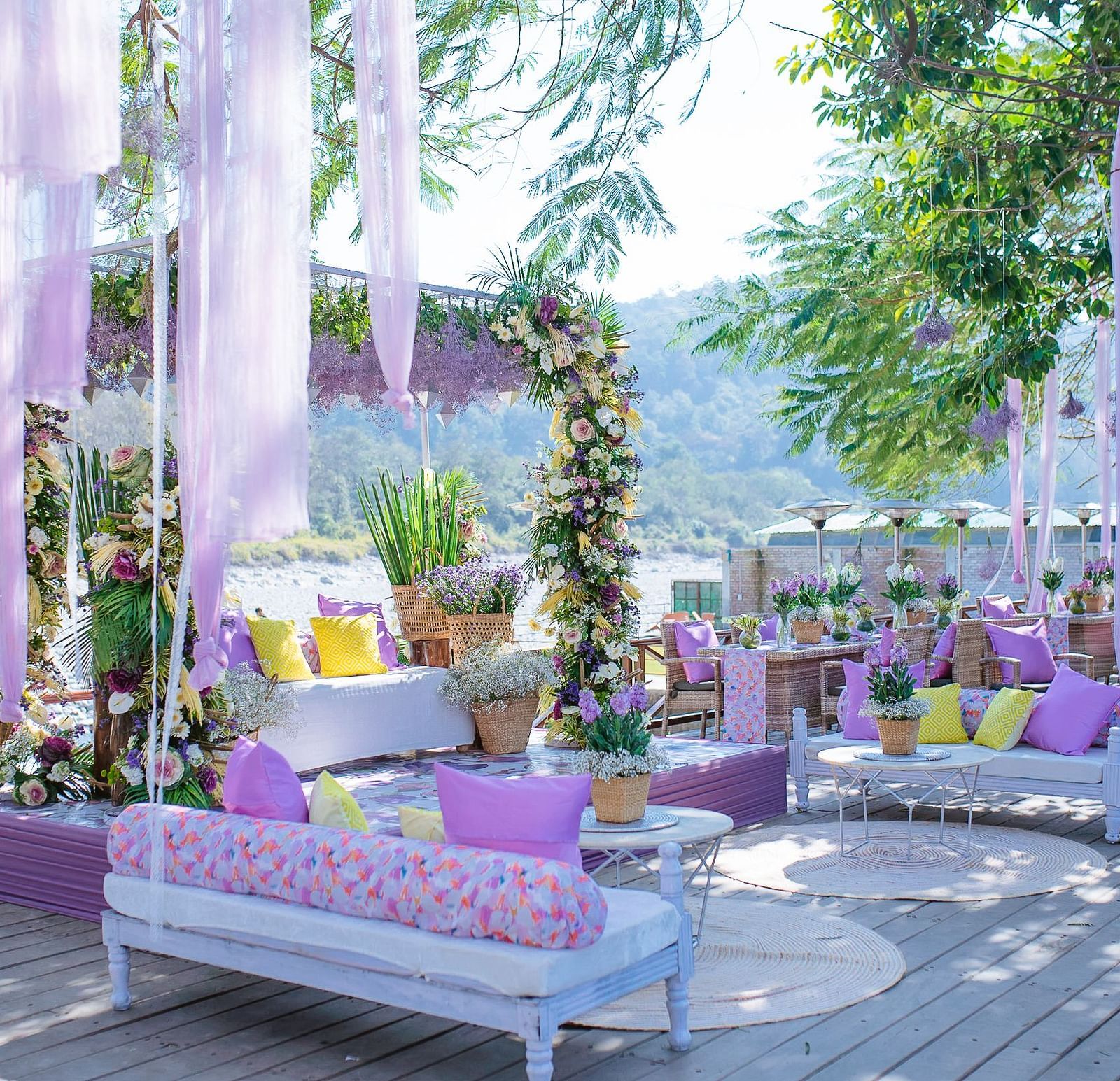 An image of an outdoor seating arrangement decorated with flowers