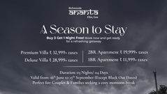 A premium white villa property with a beautiful curved swimming pool and lush green lawns under a cloudy sky, promoting a monsoon stay in Goa.