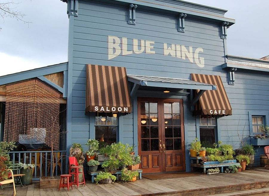 The inviting entrance of the Blue Wing Saloon, a delightful dining option connected to the Tallman Hotel.