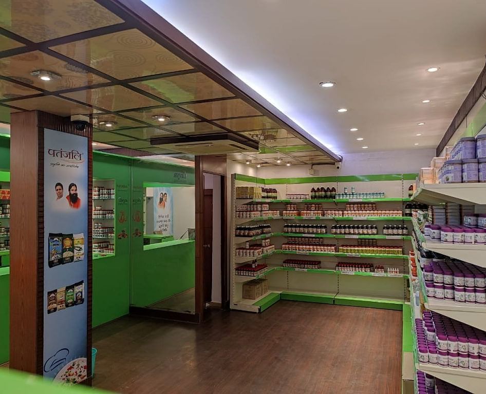 A brightly lit interior space, perhaps a shop or display area at Vedikant Resorts The Mallard Corbett, shows various items.