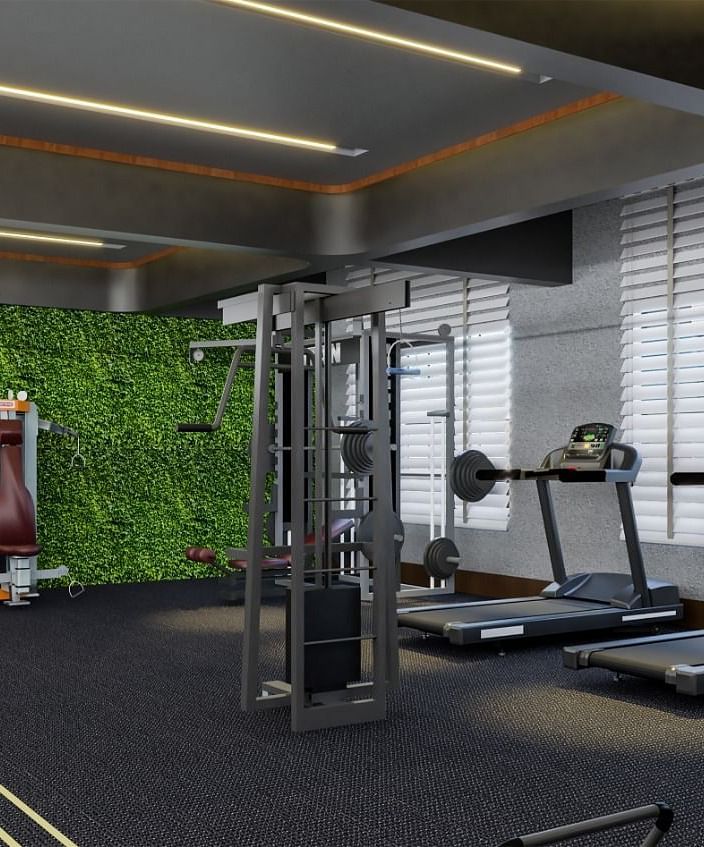 image of a gym in Kinshasa at Kertel Suites with various fitness equipment 