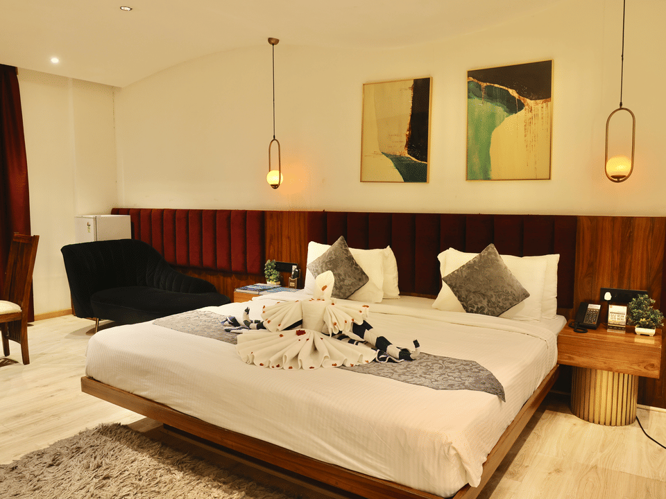 Skyline by Miraya, Miraya Club, King bed dressed with swan towel art