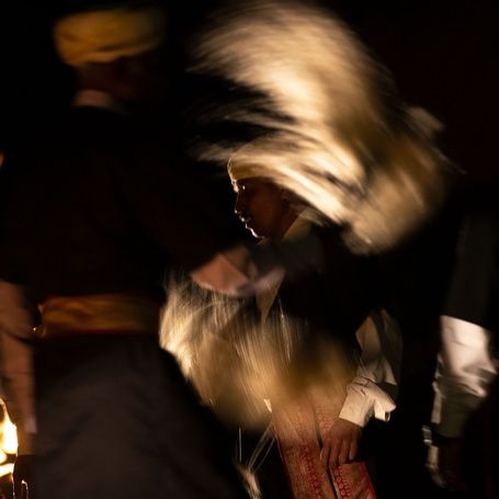 Motion blur photo of a Kodava dancer.