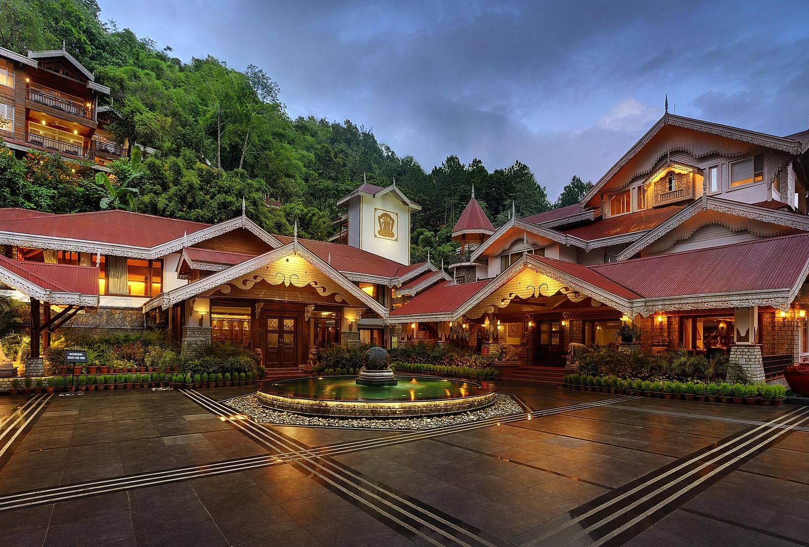 the exterior facade during night time -  Mayfair Spa Resort & Casino Gangtok 