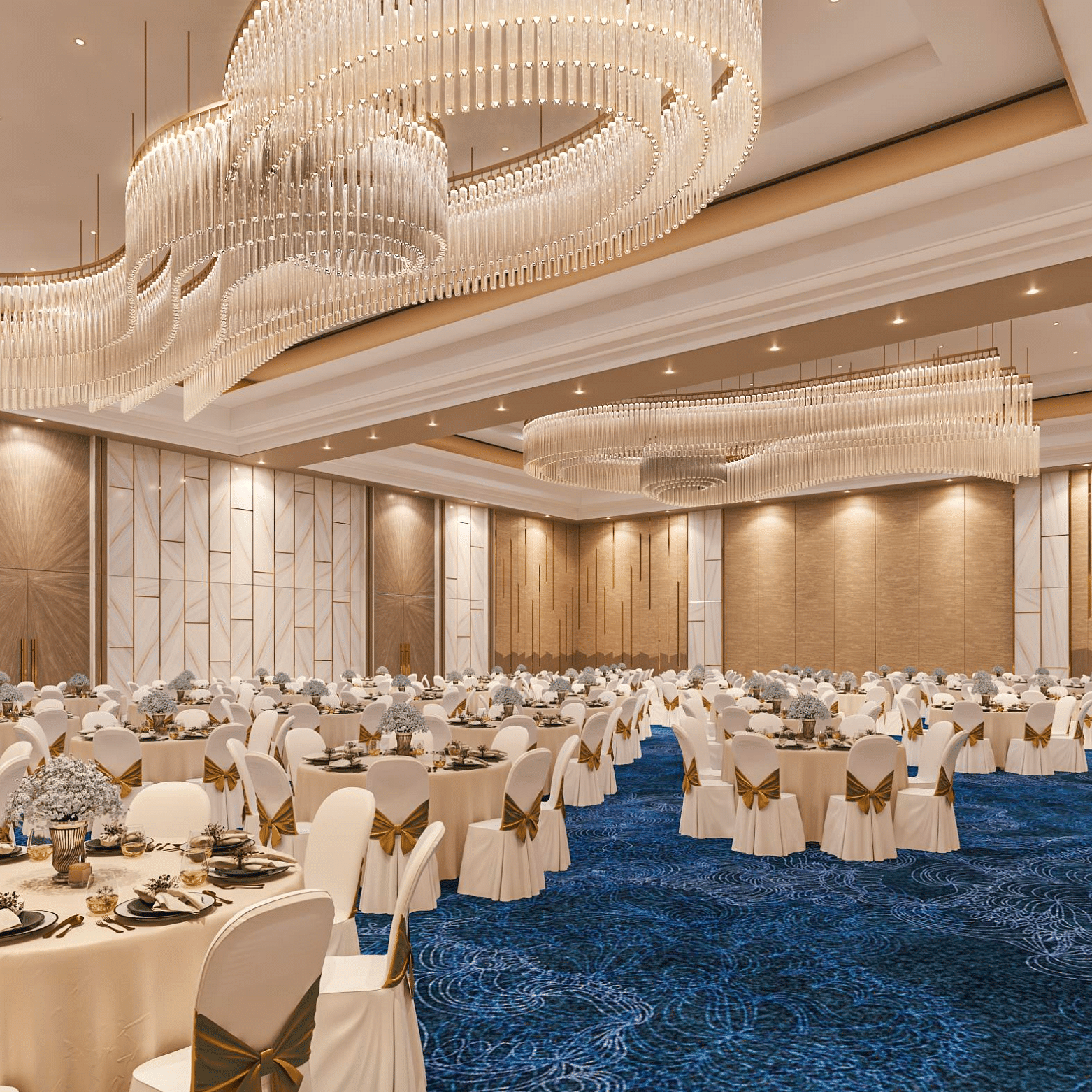 A banquet seating arrangement with chandeliers, blue carpet and modern interior