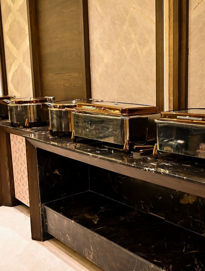 Close up view of buffet boxes arranged on the table at BluSalzz Residence, Amritsar