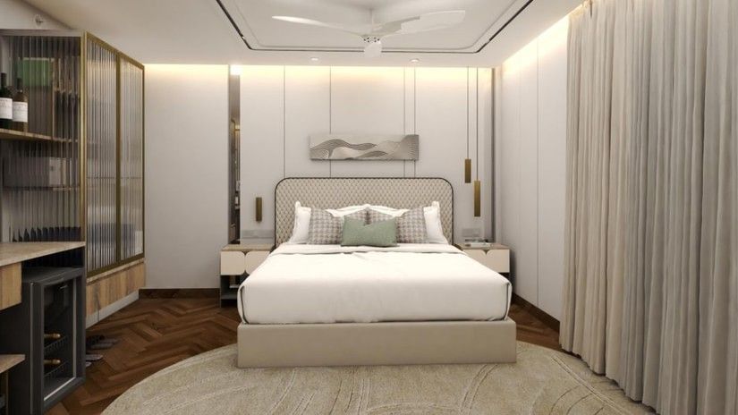Studio bedroom with bed and shelves on the side at Hablis Hotel, offering ideal family accommodation in Chennai.