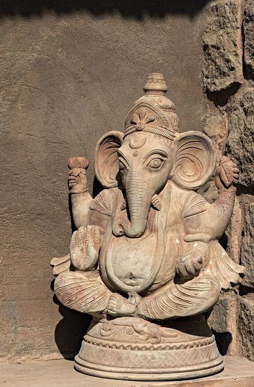 A close up shot of the idol of Lord  - MANVAR Resort & Desert Camp