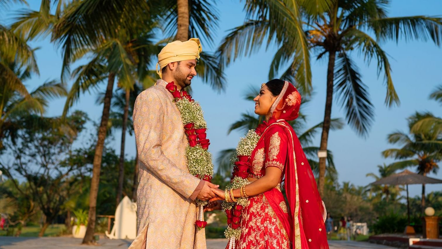 a couple looking at each other after their wedding - Caravela Beach Resort Goa