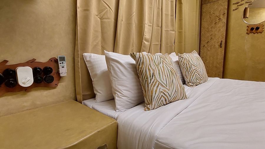A bed with bedding | Matsya Island Retreat