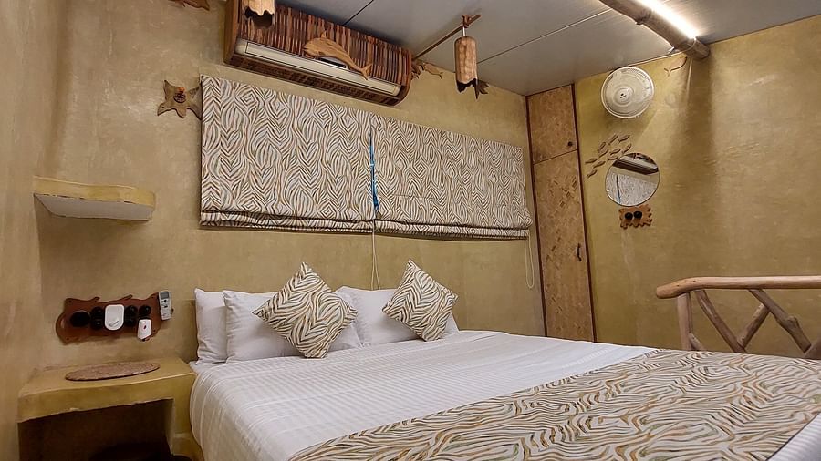 Bed with bedding in the room | Matsya Island Retreat