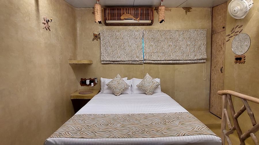 Bed with bedding in the room | Matsya Island Retreat