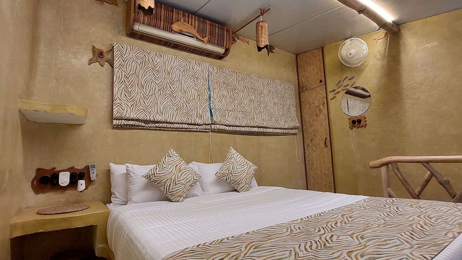 Bed with bedding in the room | Matsya Island Retreat