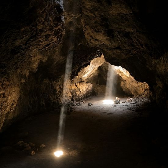 Photo of light towards inside a cave.
