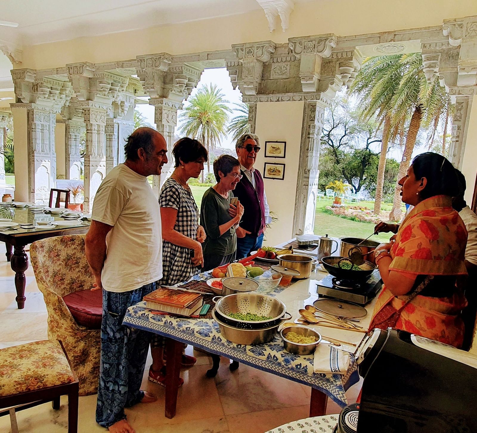 Tourists attending the cooking classes at Dev Shree, Deogarh 