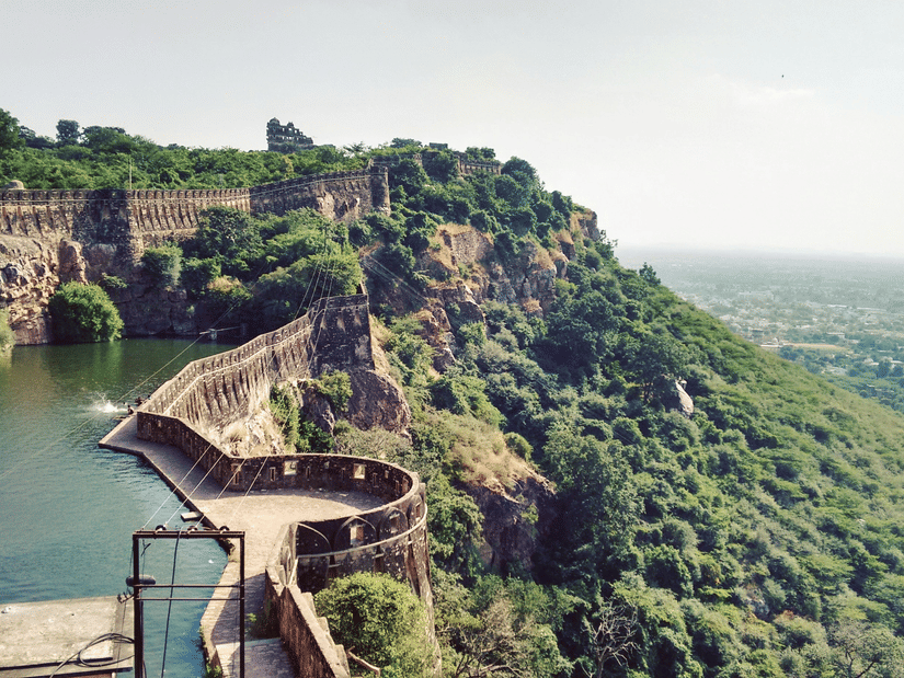 Chittorgarh Fort featuring the Gaumukh Reservoir on the hilltop