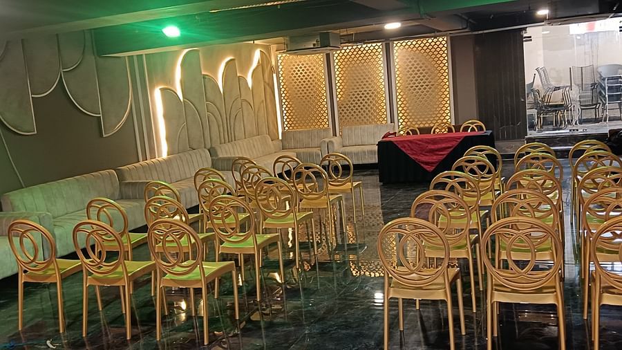 An image of Utsav Banquet hall with several chairs and table set- Bamboo Saa Mulberry Resort, Pushkar