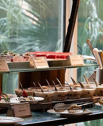 A buffet placed on a table at Nirvana Luxury Hotel, Ludhiana.