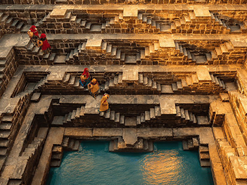 The Chand Baori with its stepwells cascading for 13 storeys with a small pool in the middle.