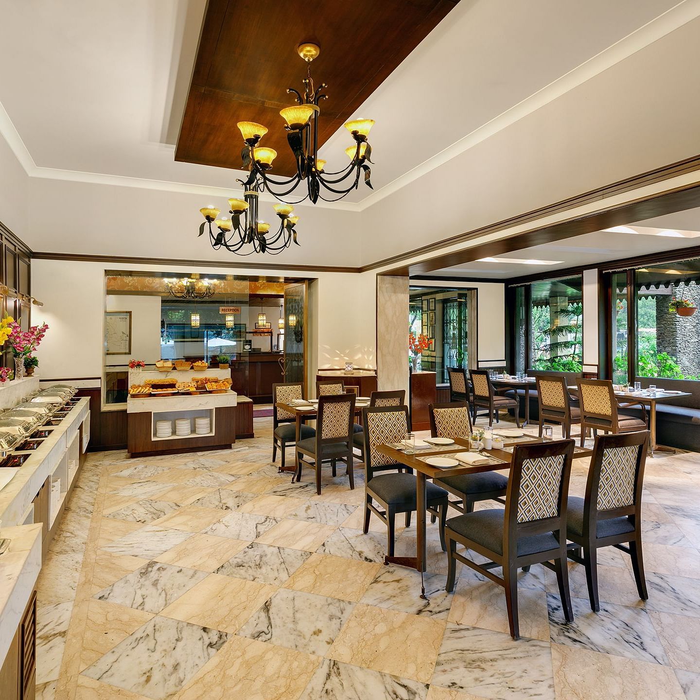 A resturant with chair and table well furnished and decorated 