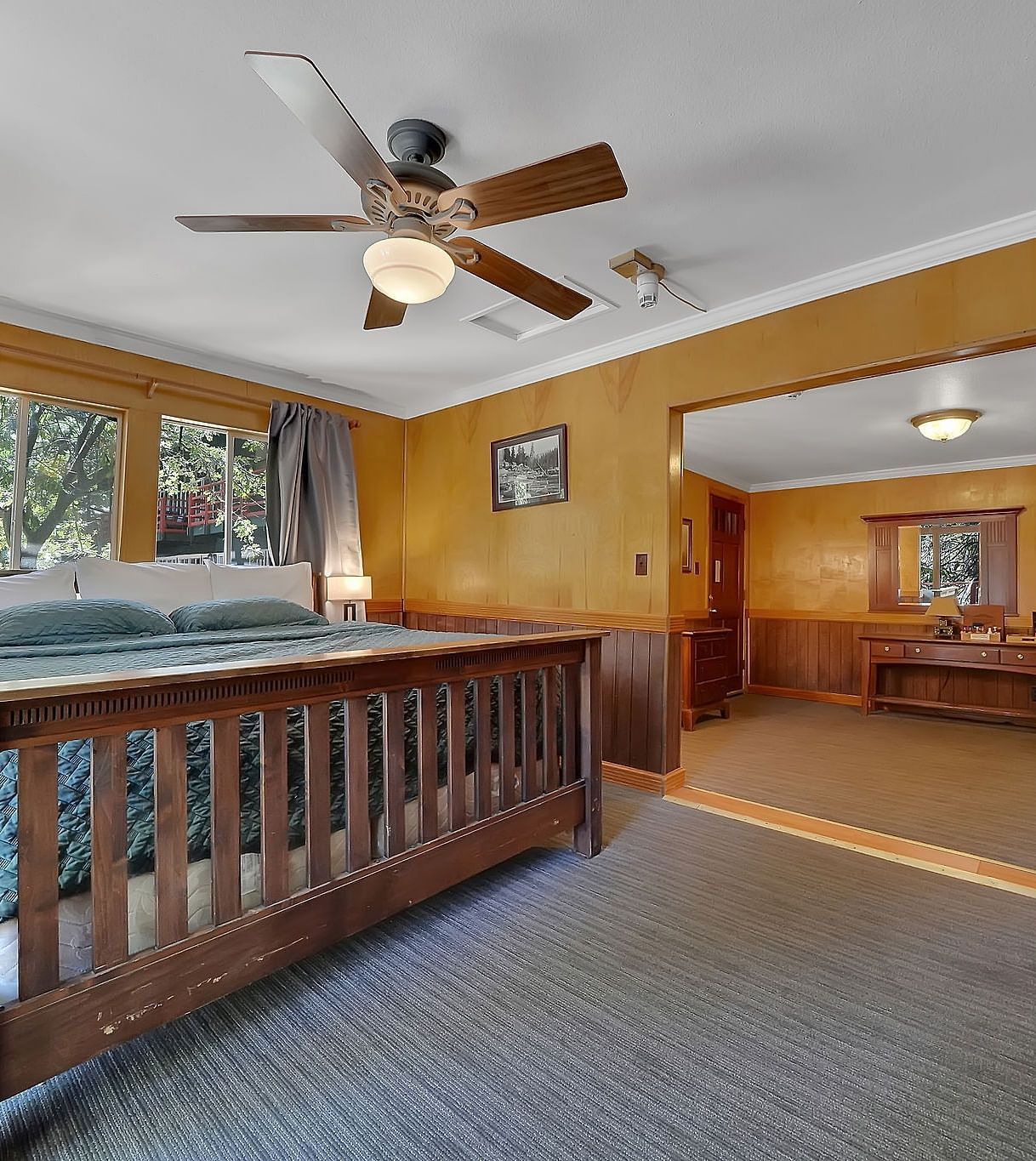 A view of a room at Narrow Gauge Inn with a double bed.