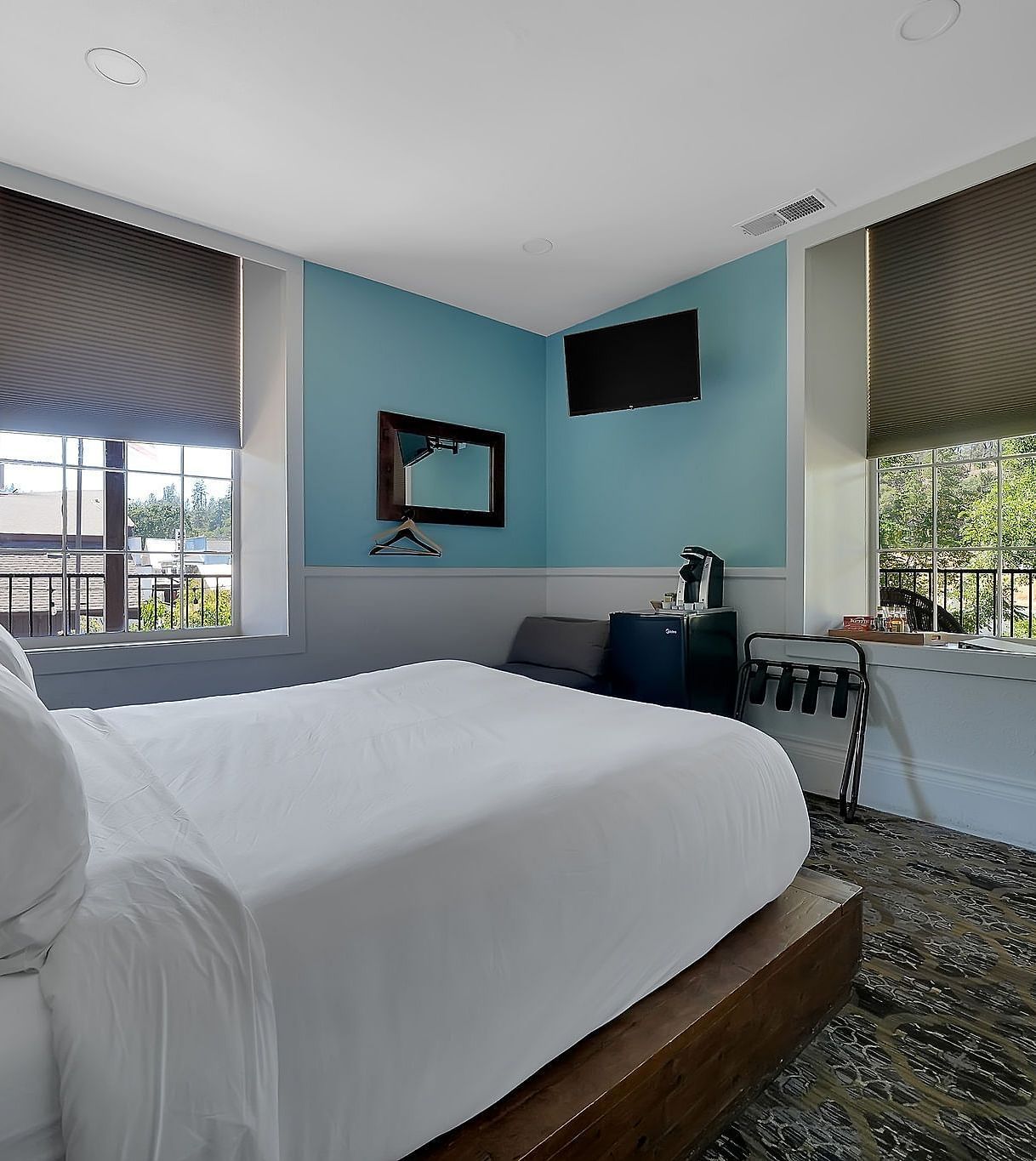 A view of a room at The Groveland Hotel with a double bed.